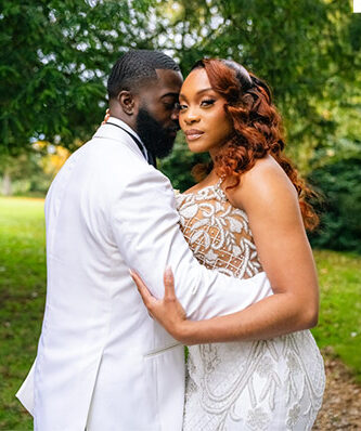thewedding.film: Multi-cultural couple taking a moment together just after getting married