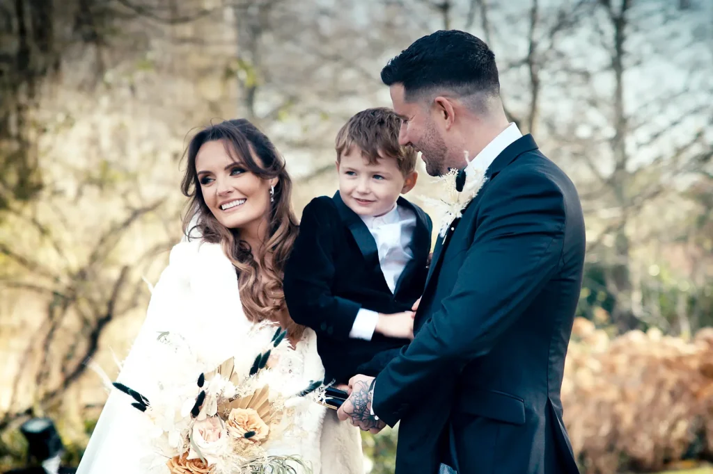 TheWedding.FILM-Bride-and-Groom-Holding-Son